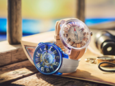 Dos relojes de edición limitada Tendence One Piece, Log Pose y East Blue, expuestos sobre un mapa náutico con la identidad de marca de la colaboración Batch N°2.