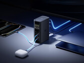 El Spacemate RD1 tiene una fuente de alimentación GaN integrada. En la imagen: una foto promocional que muestra la base de conexión cargando varios dispositivos.