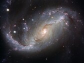 Una imagen que muestra la galaxia NGC 1672 y las estrellas del universo. (Fuente de la imagen: WikiImages - Pixabay)