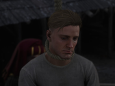 Una captura de pantalla que muestra a Sir Hans Capon siendo colgado en Kingdom Come Deliverance 2